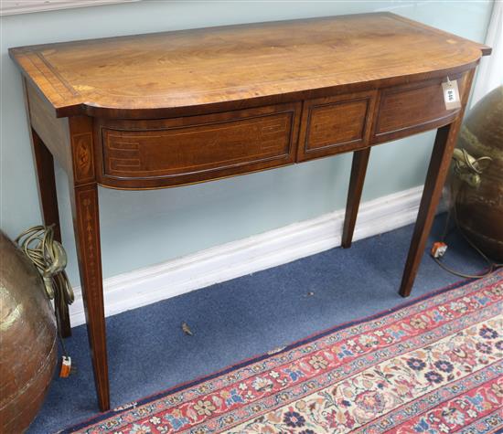 A George III mahogany and marquetry bow fronted two drawer serving table W.117cm